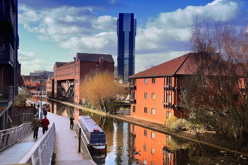 People walking along the canal in Birmingham, England.