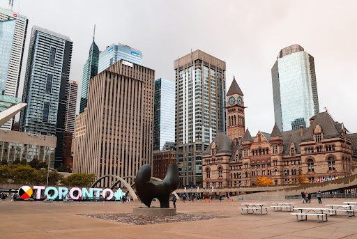 Toronto buildings and sculptures on a cloudy day