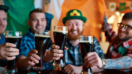 Irish men with pints of Guinness