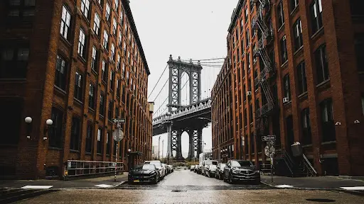 Urban street with apartment buildings in New York City.