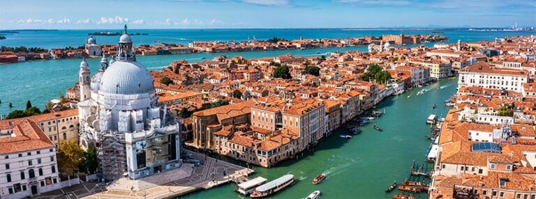 Aerial panoramic cityscape of venice with santa maria della salute church, veneto, italy