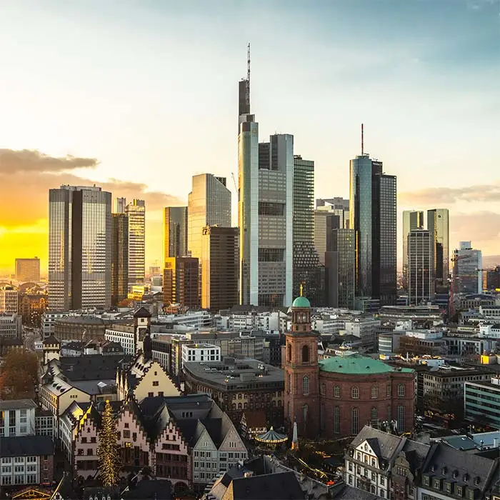 Cityscape of Frankfurt covered in modern buildings during the sunset in Germany