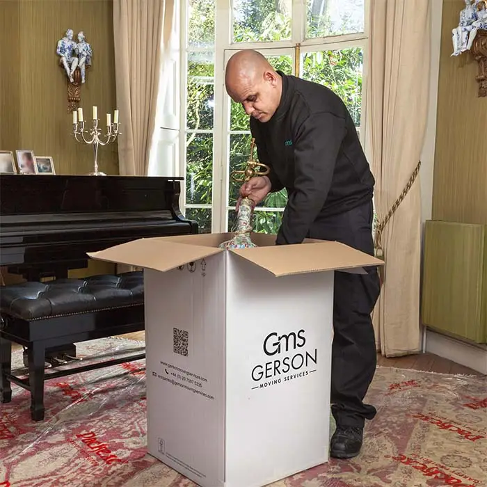 GMS Packing antiques in box