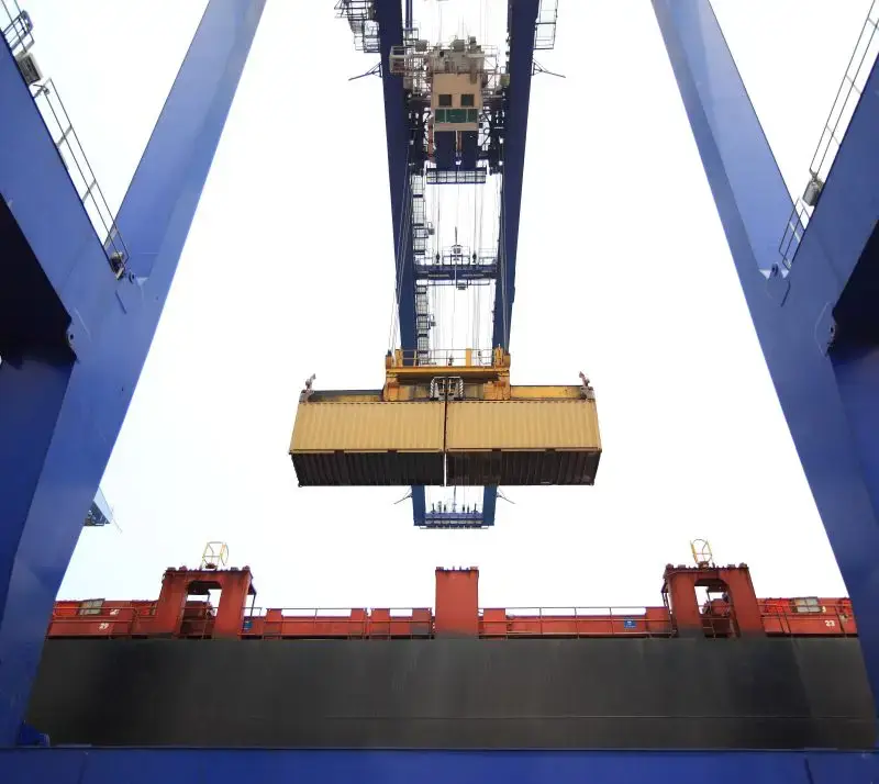 Loading household goods into shipping container for overseas move