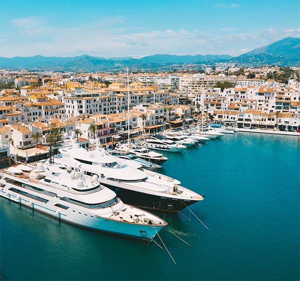 Aerial top view of luxury yachts in Puerto Banus marina, Marbella, Spain