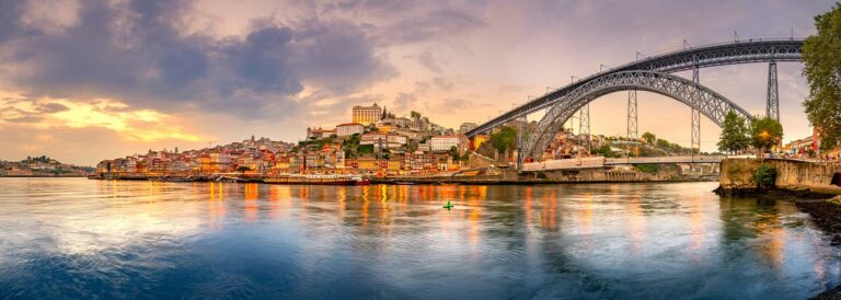 Famous bridge Ponte dom Luis above old town of Porto at river Duoro, Portugal