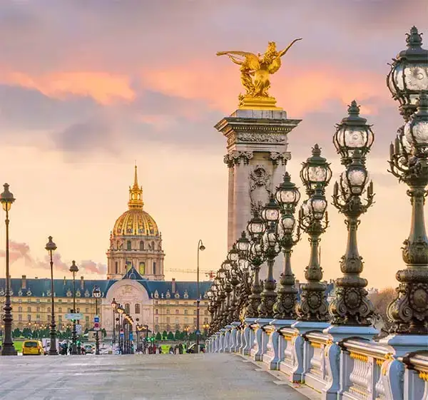 The alexander iii bridge across seine river in paris, france at sunrise