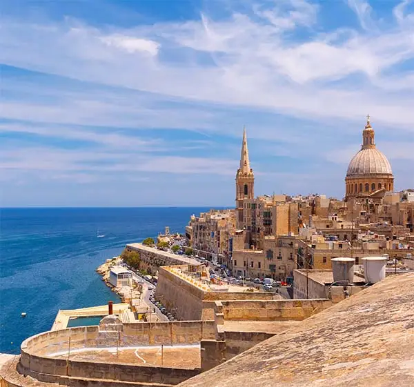 view-from-domes-churches-roofs-with-church-our-lady-mount-carmel-st-paul-s-anglican-pro-cathedral-valletta-capital-city-malta