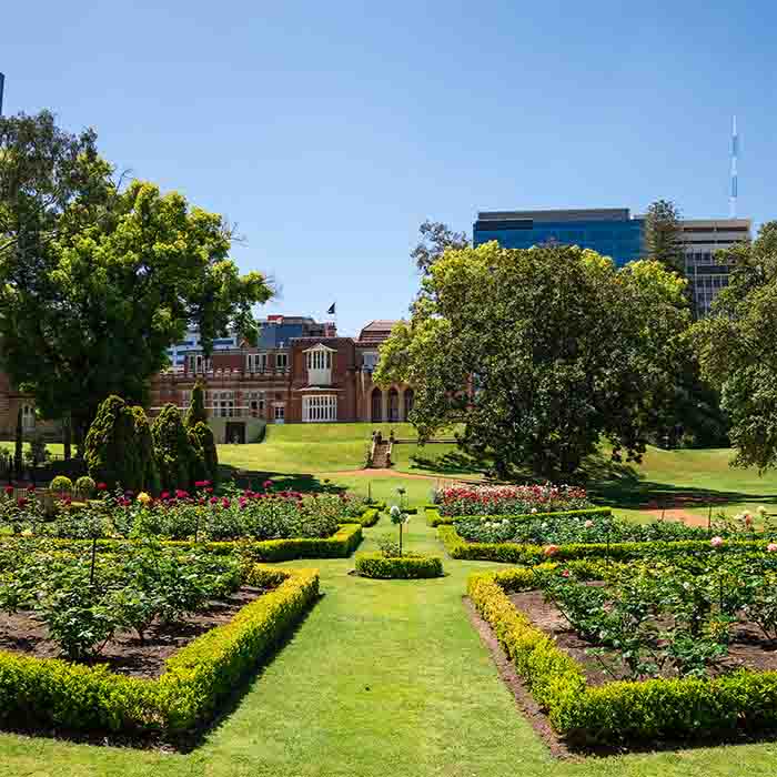 Flower beds in landscaped gardens at Government House in Perth City, Western Australia
