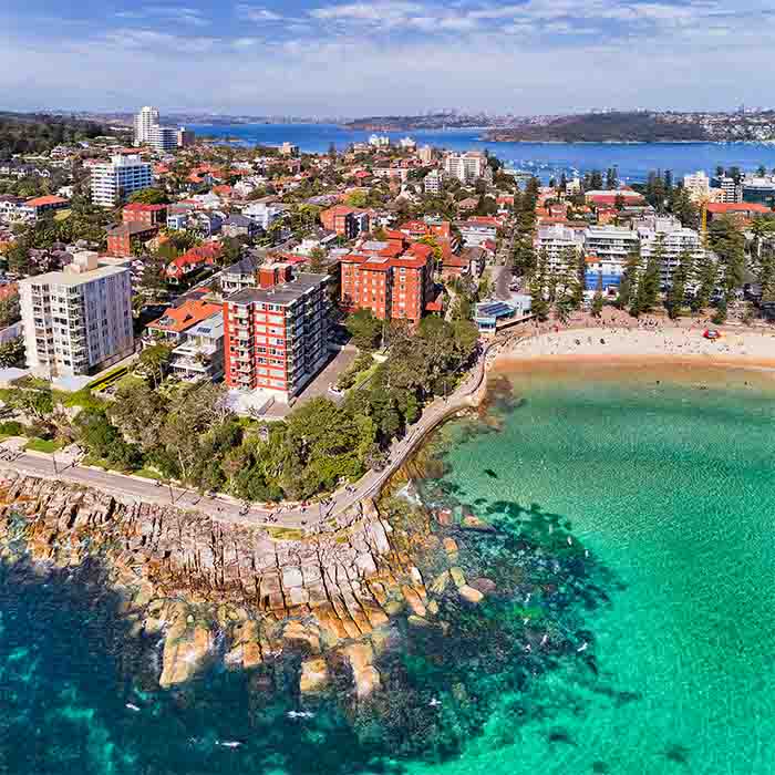 Manly Beach of Sydney Northern beaches with distant Sydney harbour