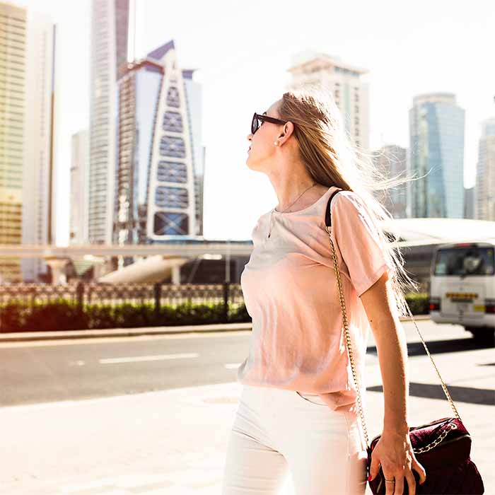 Woman walking on Street in Dubai
