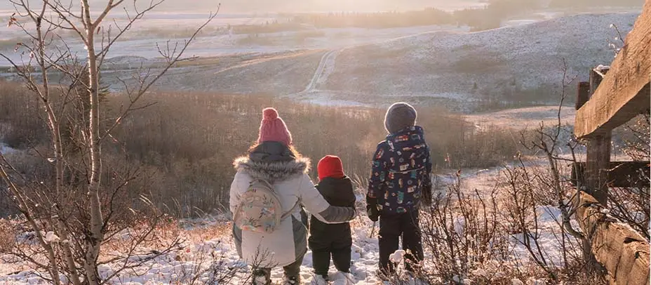 Winter lifestyle in Canada – family enjoying a snowy day