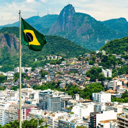 Flag of brazil with rio de janeiro in the background