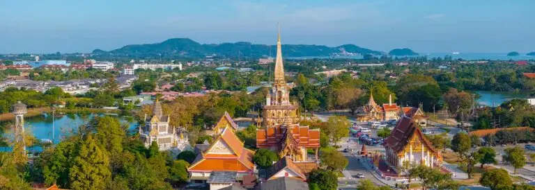 Aerial view of wat chalong temple with golden spire in phuket thailand