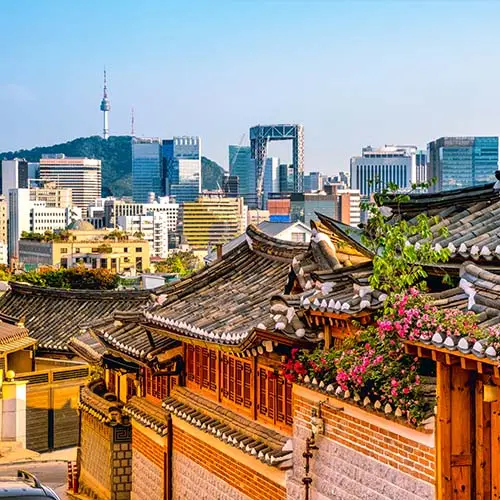 Bukchon Hanok Village with modern building in Seoul, South Korea